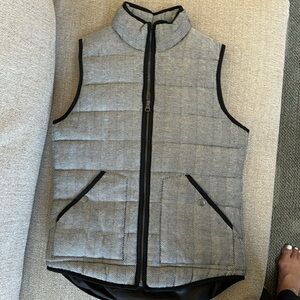Black and white quilted vest lined
